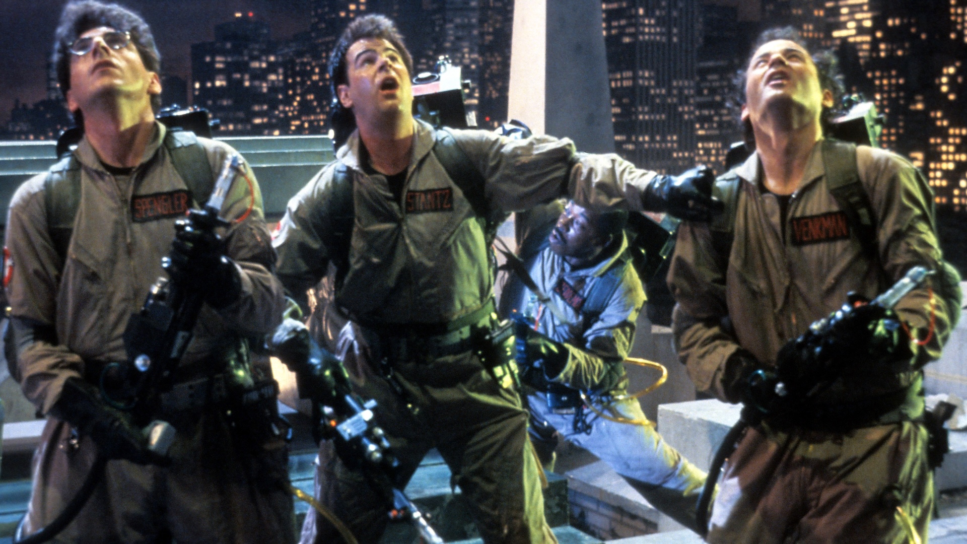 Left to right: Harold Ramis, Dan Aykroyd, Ernie Hudson (background) and Bill Murray in a scene from the film 'Ghostbusters', directed by Ivan Reitman, 1984. (Photo by Columbia Pictures/Getty Images)