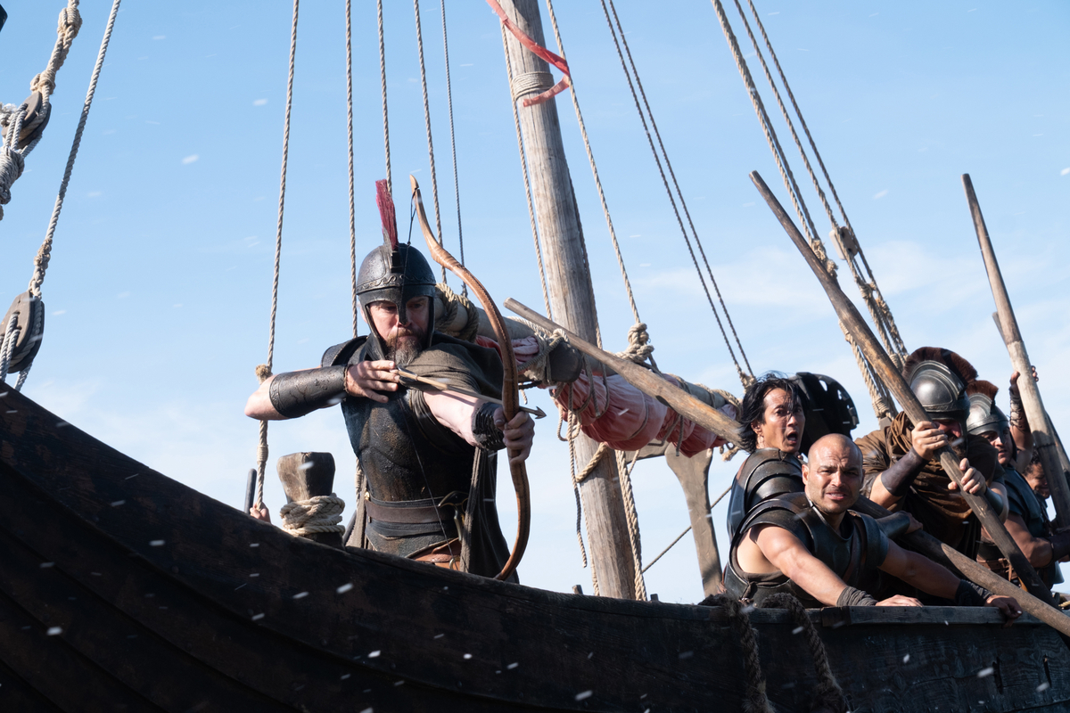 Matt Damon (frame left, with bow) is Odysseus in THE ODYSSEY, written, produced, and directed by Christopher Nolan.